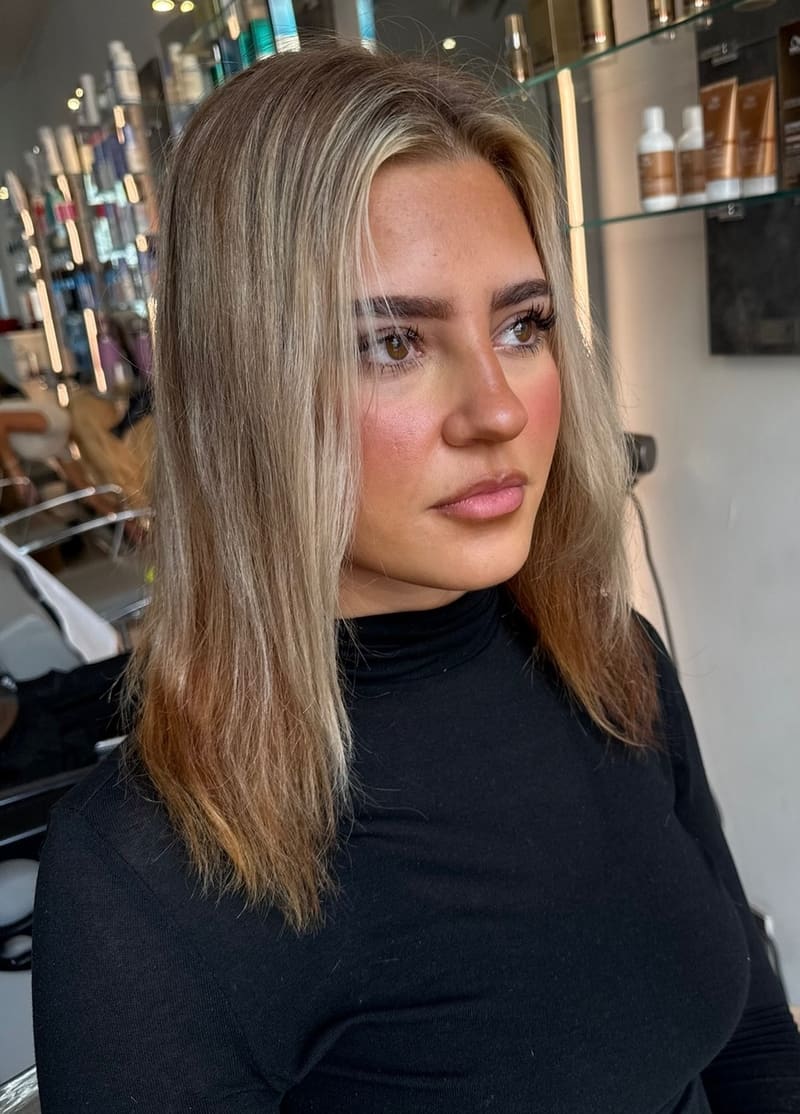 Before: shoulder-length blonde hair with warm, faded ends.