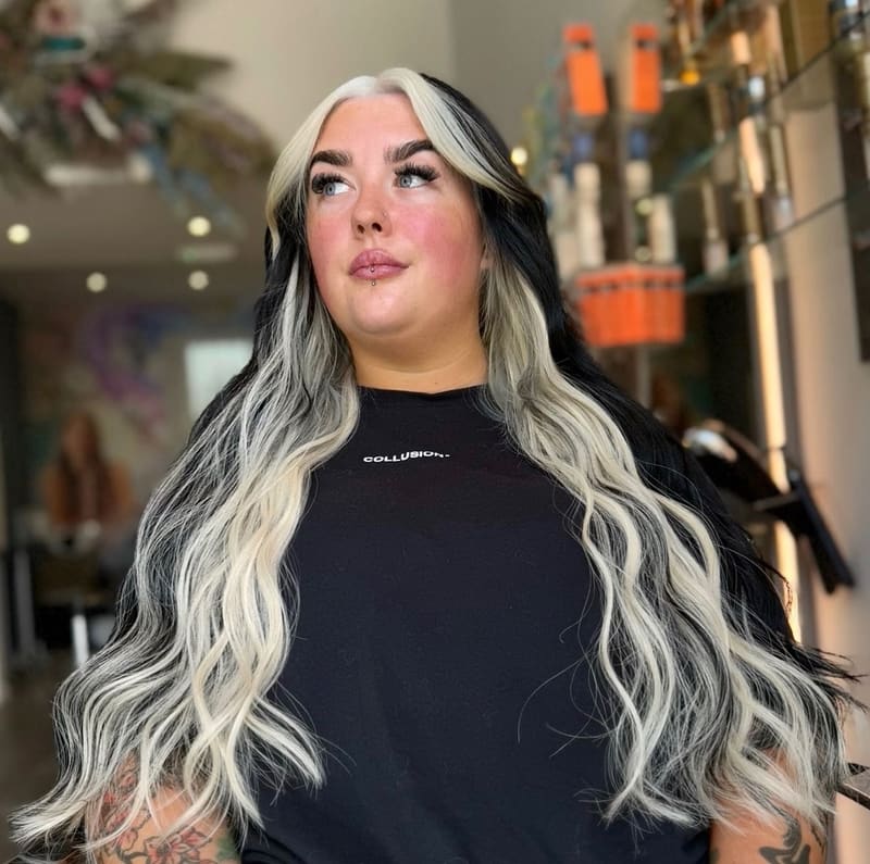 Blonde over a black underneath section, worn long.