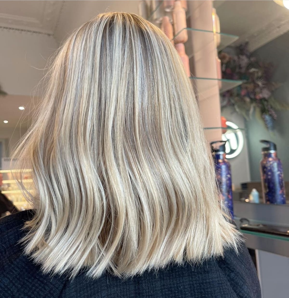An icy blonde lob, seen from behind.