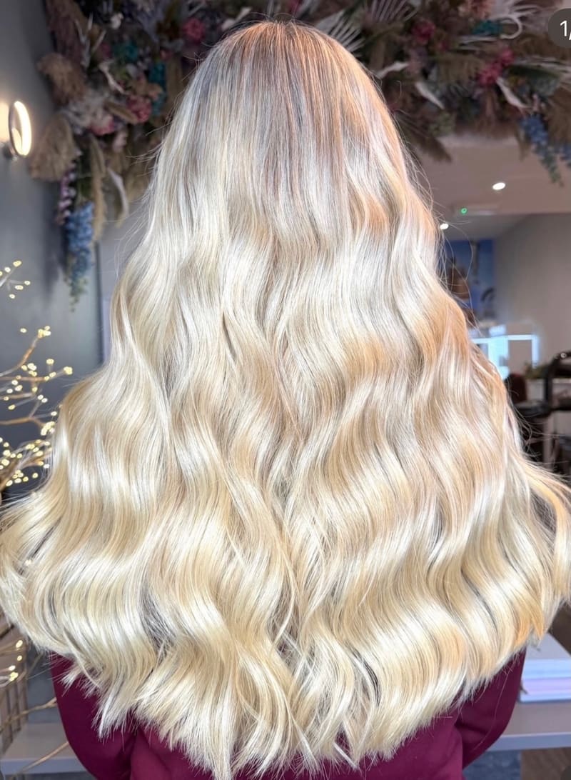 Pale blonde waves down the back.