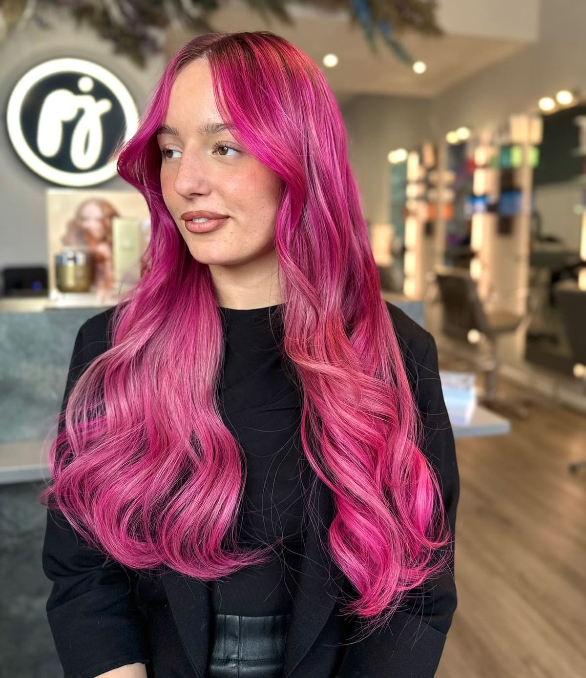 Magenta pink through long hair.