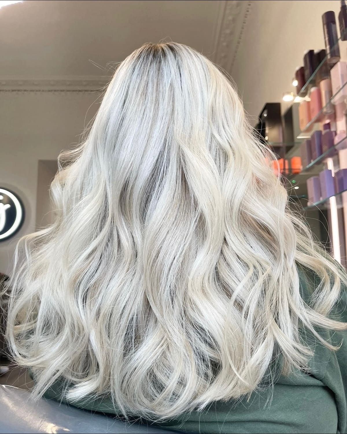 White blonde waves, seen from behind.